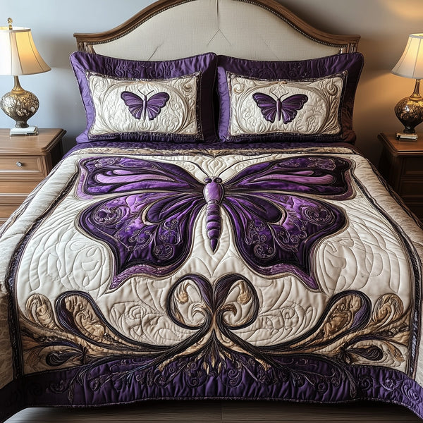 Midnight Butterfly quilted 3-piece bedding set on a made bed with two matching pillow shams