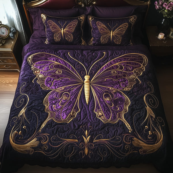 Midnight Butterfly quilted 3-piece bedding set on a made bed with two matching pillow shams