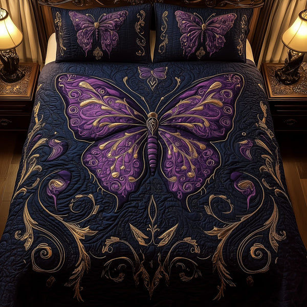Midnight Butterfly quilted 3-piece bedding set on a made bed with two matching pillow shams