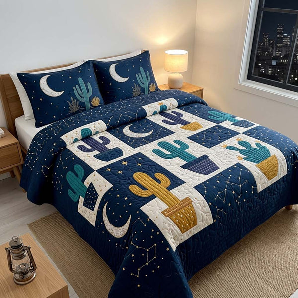 Midnight Cactus Sky quilted 3-piece bedding set on a made bed with two matching pillow shams