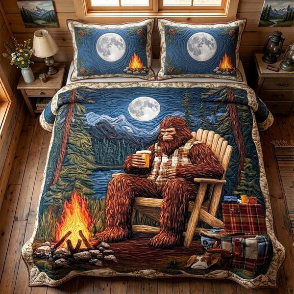Midnight Campfire quilted 3-piece bedding set on a made bed with two matching pillow shams