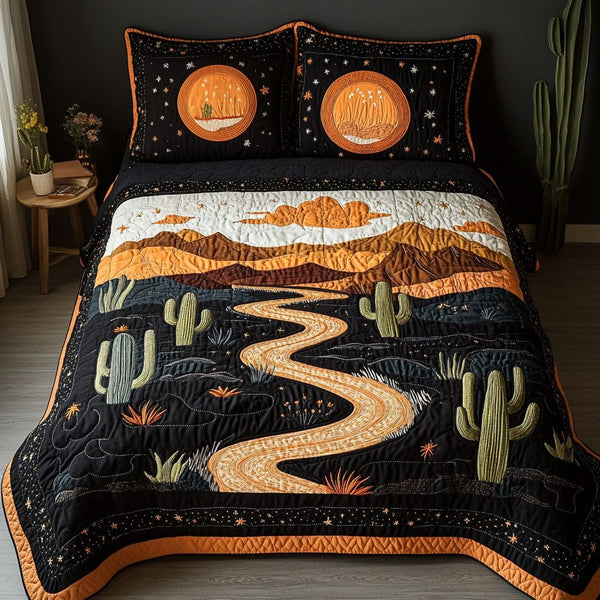 Midnight Canyon quilted 3-piece bedding set on a made bed with two matching pillow shams