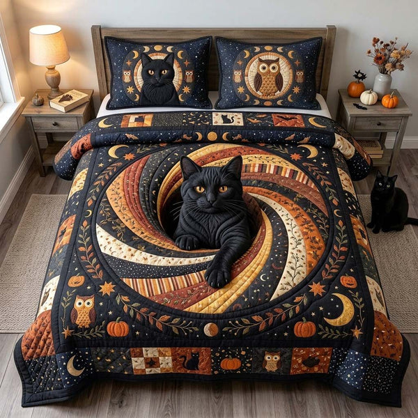 Midnight Cat Nest quilted 3-piece bedding set on a made bed with two matching pillow shams