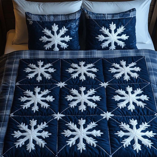 Midnight Flakes quilted 3-piece bedding set on a made bed with two matching pillow shams