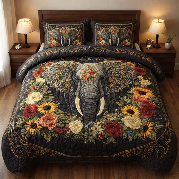 Midnight Floral Elephant quilted 3-piece bedding set on a made bed with two matching pillow shams