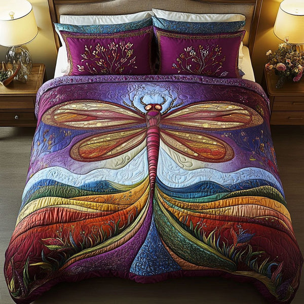 Midnight Flutter quilted 3-piece bedding set on a made bed with two matching pillow shams