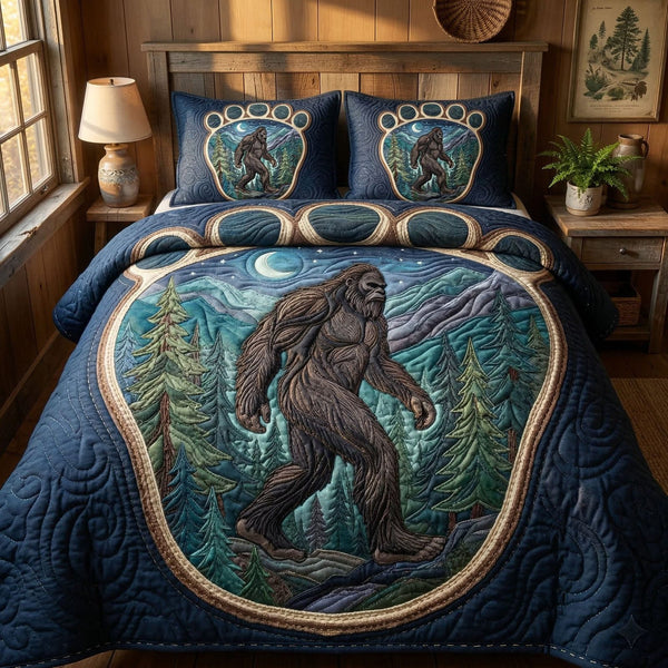 Midnight Forest quilted 3-piece bedding set on a made bed with two matching pillow shams