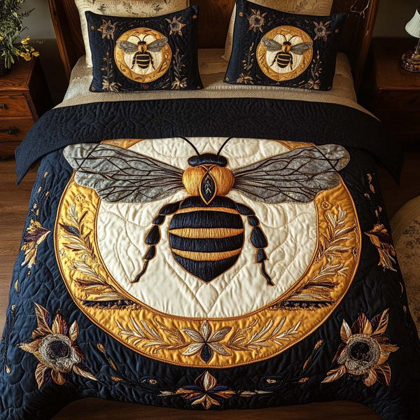 Midnight Glow quilted 3-piece bedding set on a made bed with two matching pillow shams