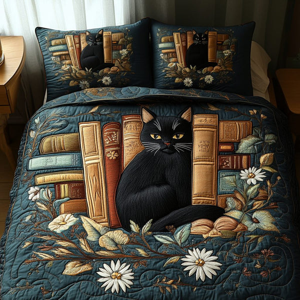 Midnight Library quilted 3-piece bedding set on a made bed with two matching pillow shams