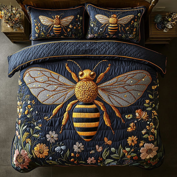 Midnight Meadow Bee quilted 3-piece bedding set on a made bed with two matching pillow shams