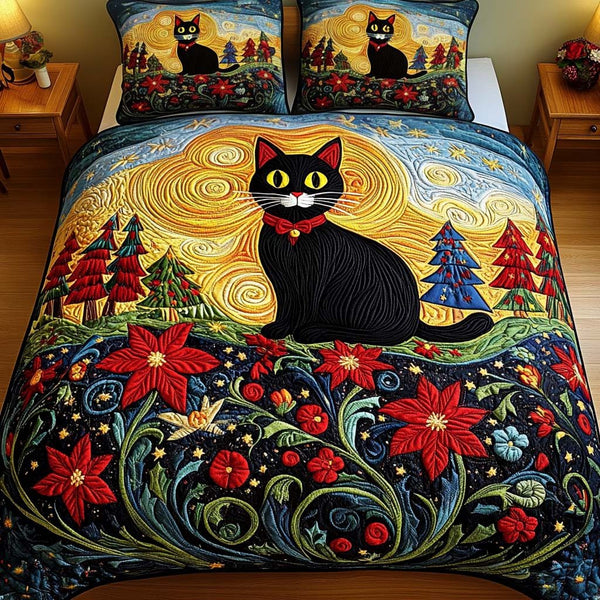 Midnight Meadow quilted 3-piece bedding set on a made bed with two matching pillow shams