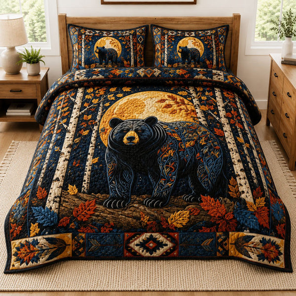 Midnight Moon Bear Forest quilted 3-piece bedding set on a made bed with two matching pillow shams