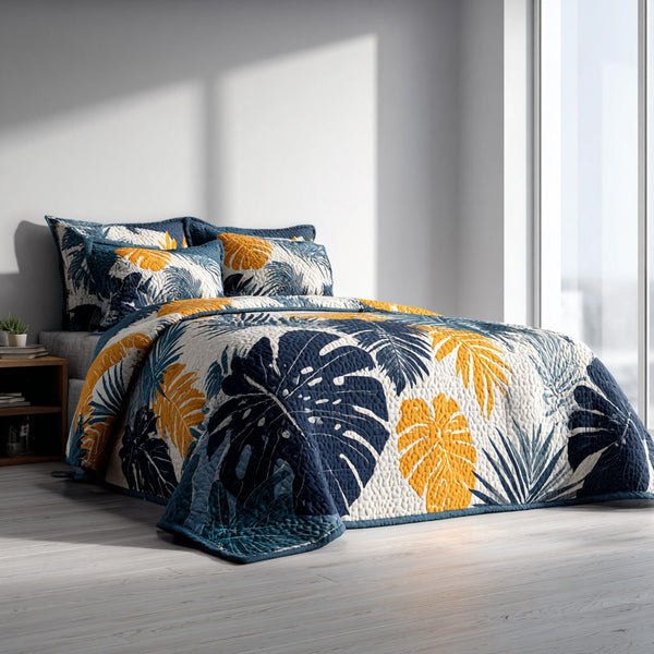 Midnight Palms quilted 3-piece bedding set on a made bed with two matching pillow shams