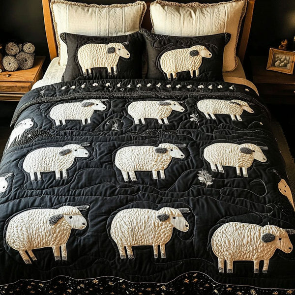 Midnight Sheep quilted 3-piece bedding set on a made bed with two matching pillow shams