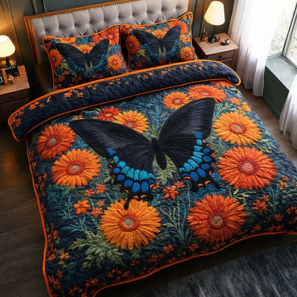Midnight Sunflower quilted 3-piece bedding set on a made bed with two matching pillow shams