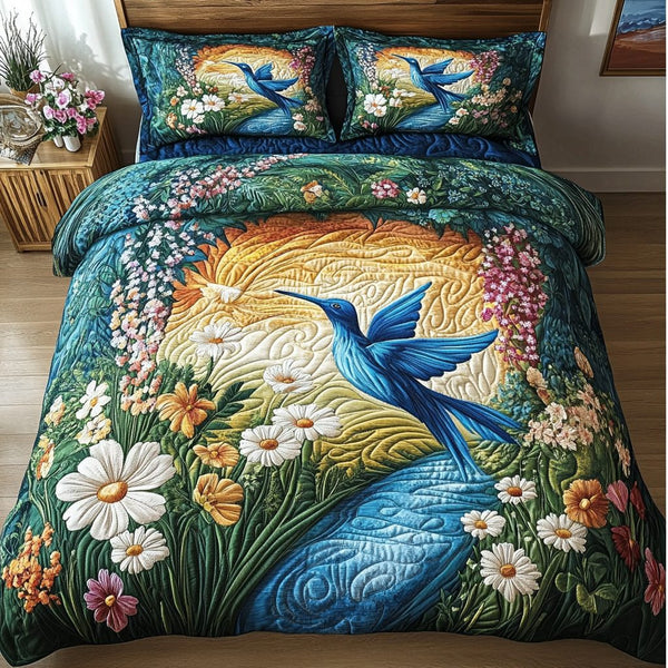 Midnight Wings quilted 3-piece bedding set on a made bed with two matching pillow shams