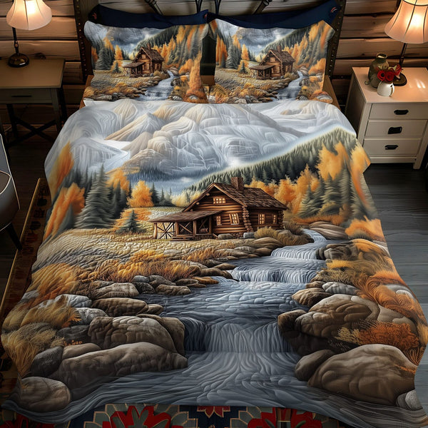Millstone Stream quilted 3-piece bedding set on a made bed with two matching pillow shams