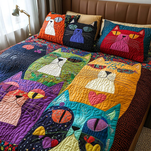 Mischief Meows quilted 3-piece bedding set on a made bed with two matching pillow shams