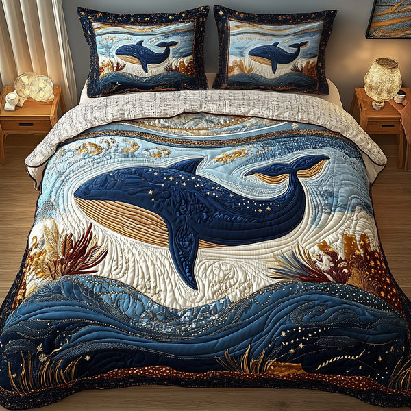 Mistique Whale quilted 3-piece bedding set on a made bed in a light coastal bedroom