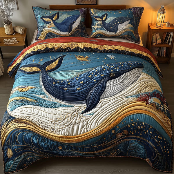 Mistique Whale quilted 3-piece bedding set on a made bed in a light coastal bedroom
