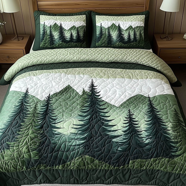Misty Forest Mountain quilted 3-piece bedding set on a made bed with two matching pillow shams