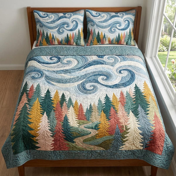 Misty Forest quilted 3-piece bedding set on a made bed with two matching pillow shams