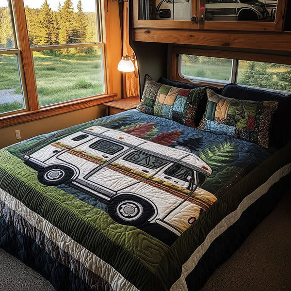 Mobile Memories quilted 3-piece bedding set on a made bed with two matching pillow shams