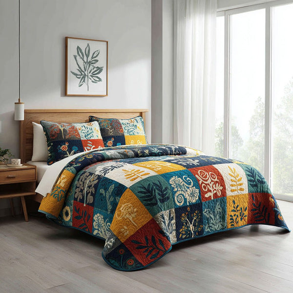 Modern Botanica quilted 3-piece bedding set on a made bed with two matching pillow shams