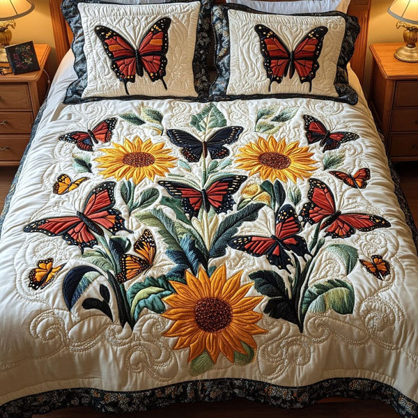 Monarch Meadow quilted 3-piece bedding set on a made bed with two matching pillow shams