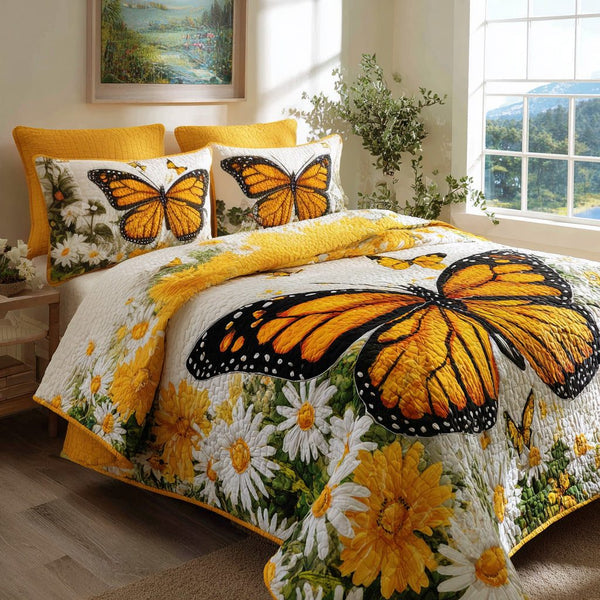 Monarch Meadow quilted 3-piece bedding set on a made bed with two matching pillow shams
