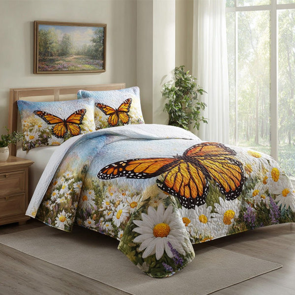 Monarch Meadow quilted 3-piece bedding set on a made bed with two matching pillow shams