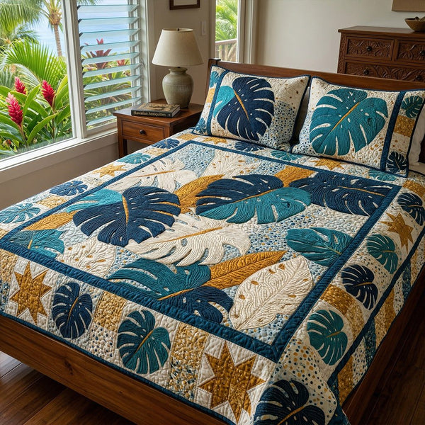 Monstera Gold quilted 3-piece bedding set on a made bed with two matching pillow shams