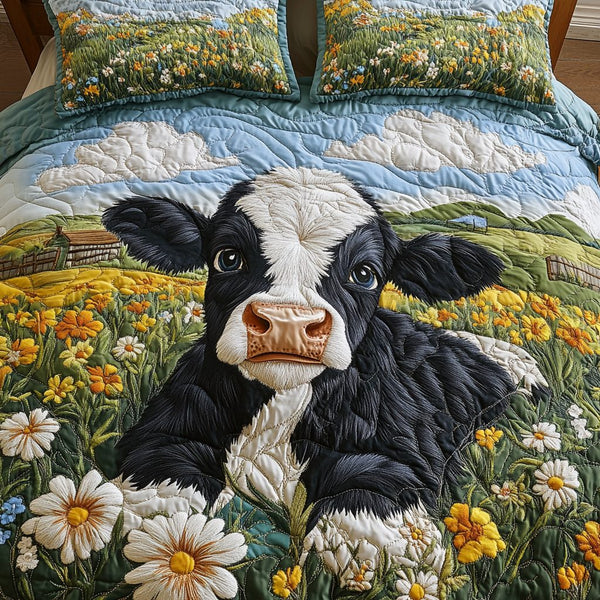 Moo Bliss quilted 3-piece bedding set on a made bed with two matching pillow shams