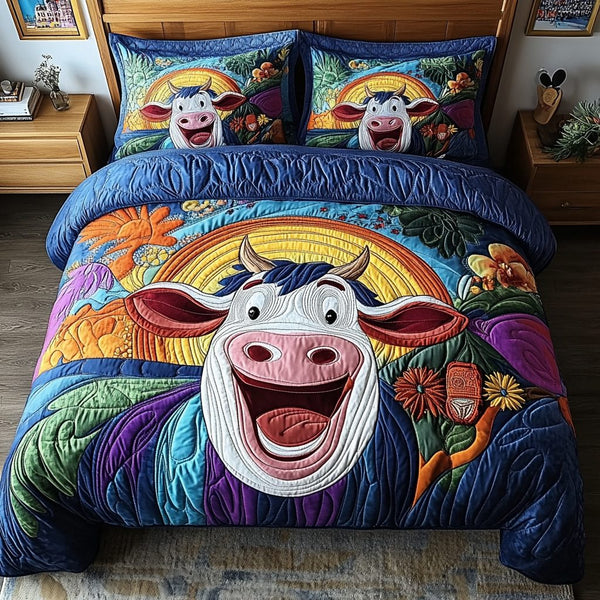Moo Magic quilted 3-piece bedding set on a made bed with two matching pillow shams