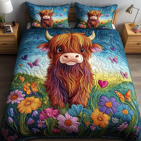 Moo Meadow quilted 3-piece bedding set on a made bed with two matching pillow shams