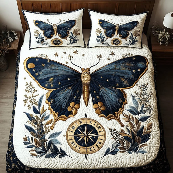 Moon Dust quilted 3-piece bedding set on a made bed with two matching pillow shams