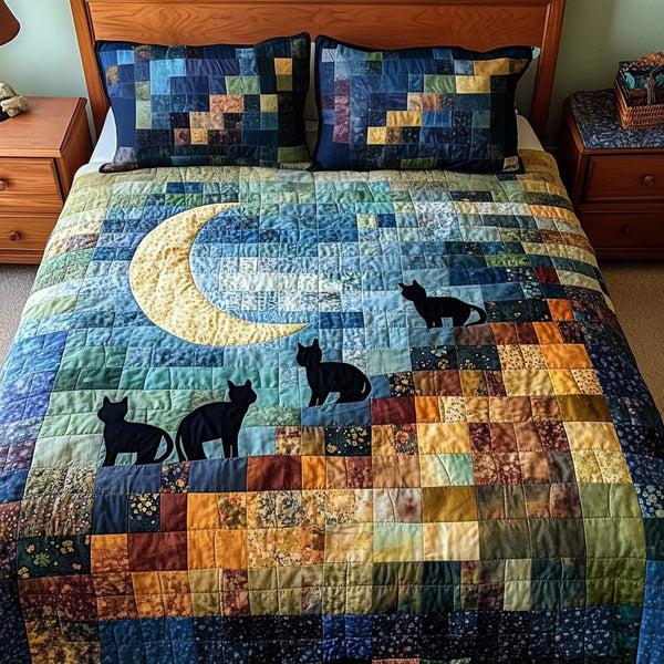 Moonlight Ascent quilted 3-piece bedding set on a made bed with two matching pillow shams