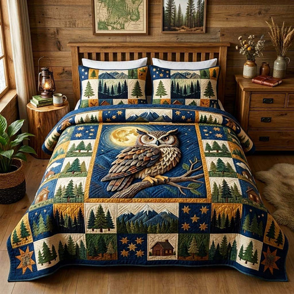 Moonlight Owl quilted 3-piece bedding set on a made bed with two matching pillow shams