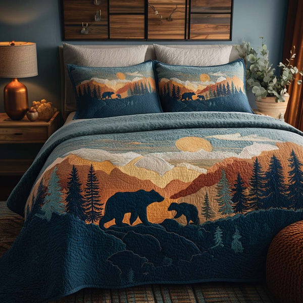 Moonlight Snuggle quilted 3-piece bedding set on a made bed with two matching pillow shams
