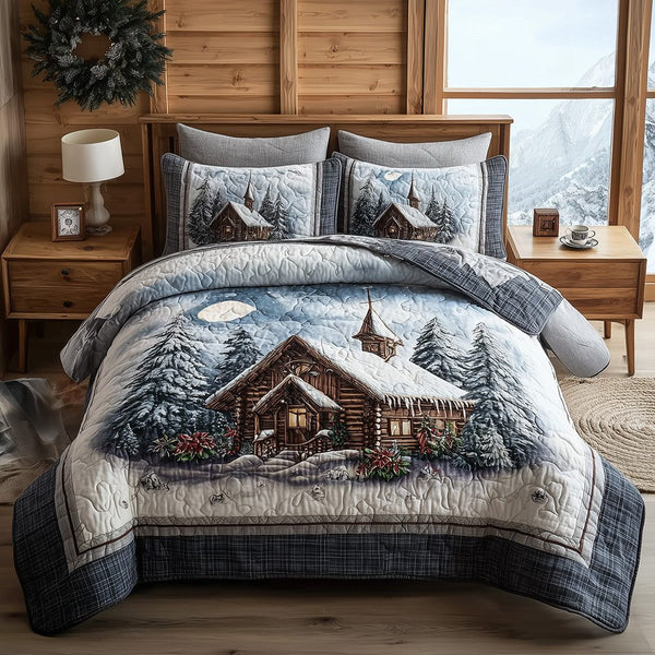 Moonlit Alpine Blessings quilted 3-piece bedding set on a made bed with two matching pillow shams