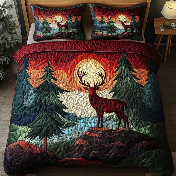 Moonlit Antlers quilted 3-piece bedding set on a made bed with two matching pillow shams