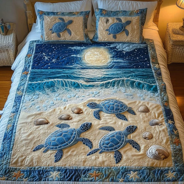 Moonlit Beach Turtles quilted 3-piece bedding set on a made bed in a light coastal bedroom