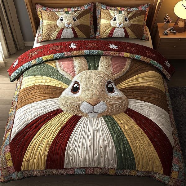 Moonlit Bunny quilted 3-piece bedding set on a made bed with two matching pillow shams