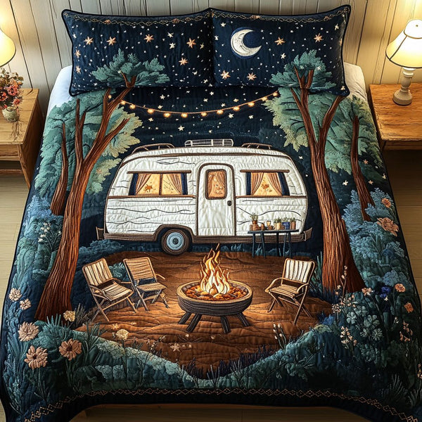 Moonlit Camper quilted 3-piece bedding set on a made bed with two matching pillow shams