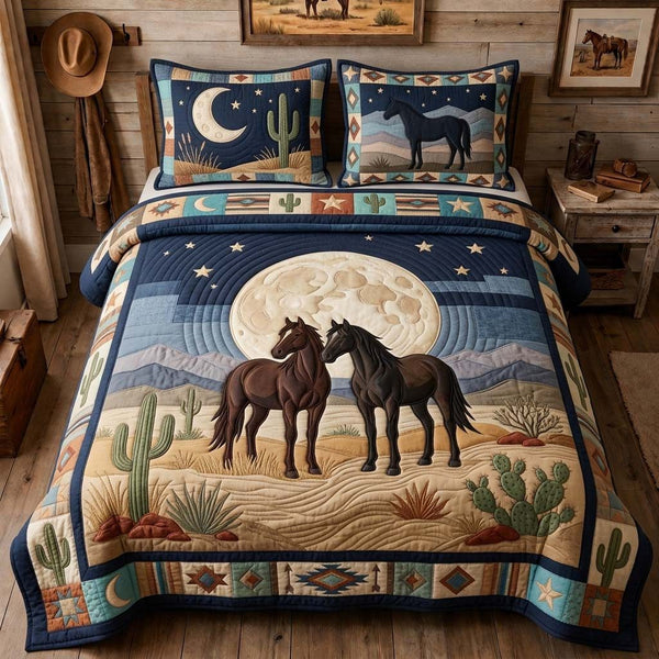Moonlit Desert Pair quilted 3-piece bedding set on a made bed with two matching pillow shams