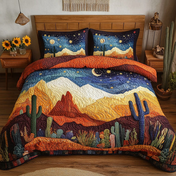 Moonlit Desert quilted 3-piece bedding set on a made bed with two matching pillow shams