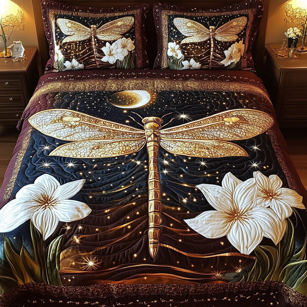Moonlit Dragonfly quilted 3-piece bedding set on a made bed with two matching pillow shams