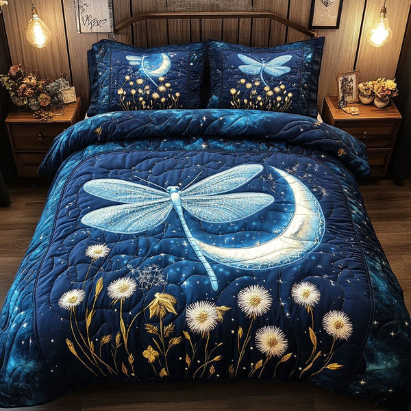Moonlit Dragonfly quilted 3-piece bedding set on a made bed with two matching pillow shams