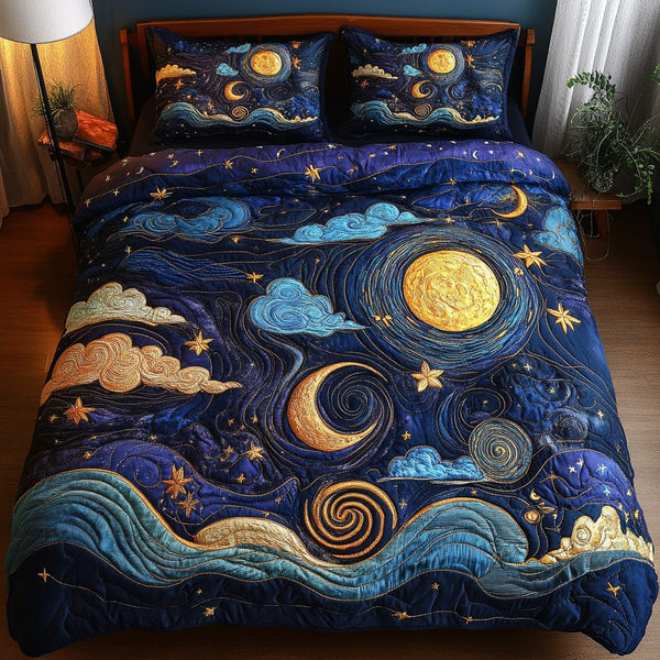 Moonlit Dreams quilted 3-piece bedding set on a made bed with two matching pillow shams