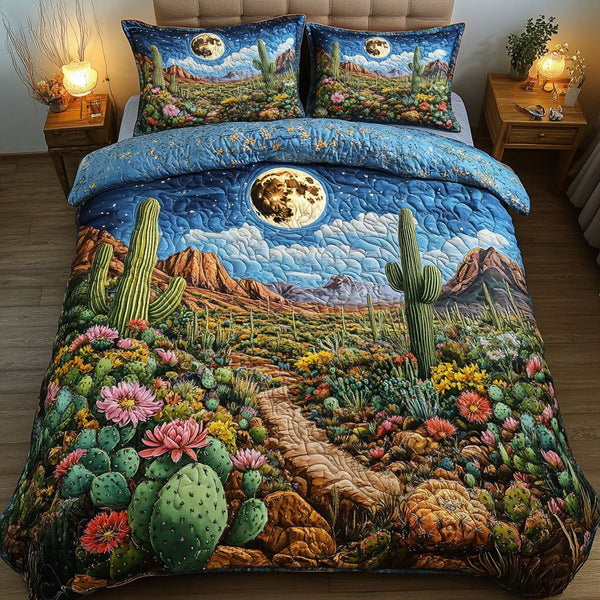 Moonlit Garden quilted 3-piece bedding set on a made bed with two matching pillow shams